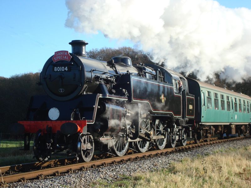 Standard class 4, 2-6-4 tank, No. 80104, seen climbing the approach to Harmans Cross with the first 'Santa Special' of the day from Swanage. (20th December 2009)